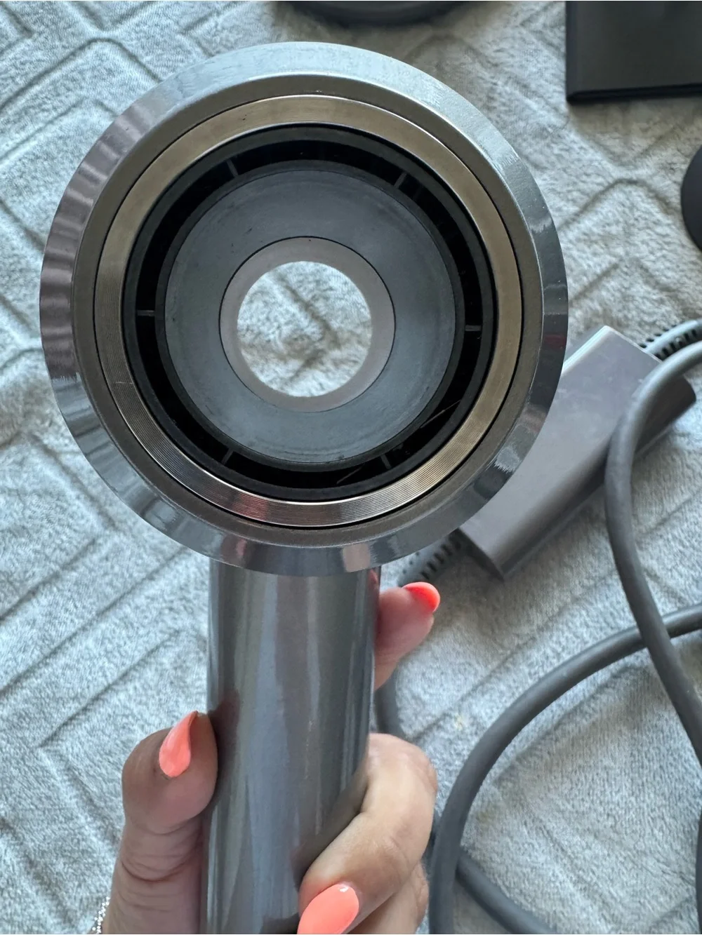 Dyson Hair Dryer with Multiple Black and Gray Styling Attachments